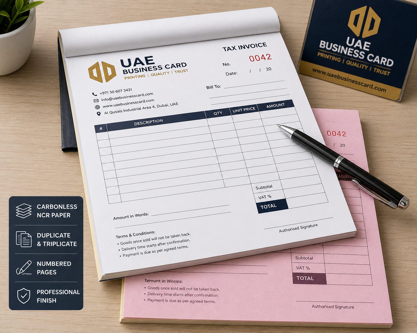Open carbonless NCR duplicate invoice book on a desk, white top sheet with a pink carbon copy beneath, company logo header and sequential number 0042 printed top-right, pen resting on the page